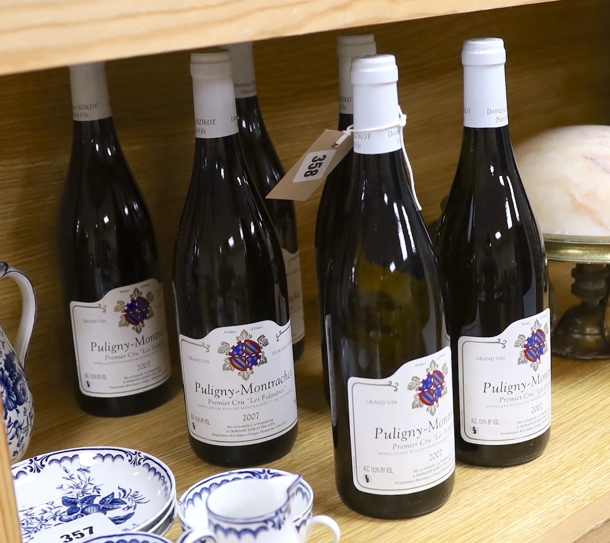 Six bottles of Domaine Bzikot Pere et Fils Puligny Montrachet 1er Cru Les Folatieres, 2007